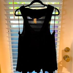 Black free people tank top! Size Medium. Slightly used.